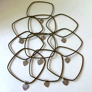 10-brass bangles with sterling silver heart charms